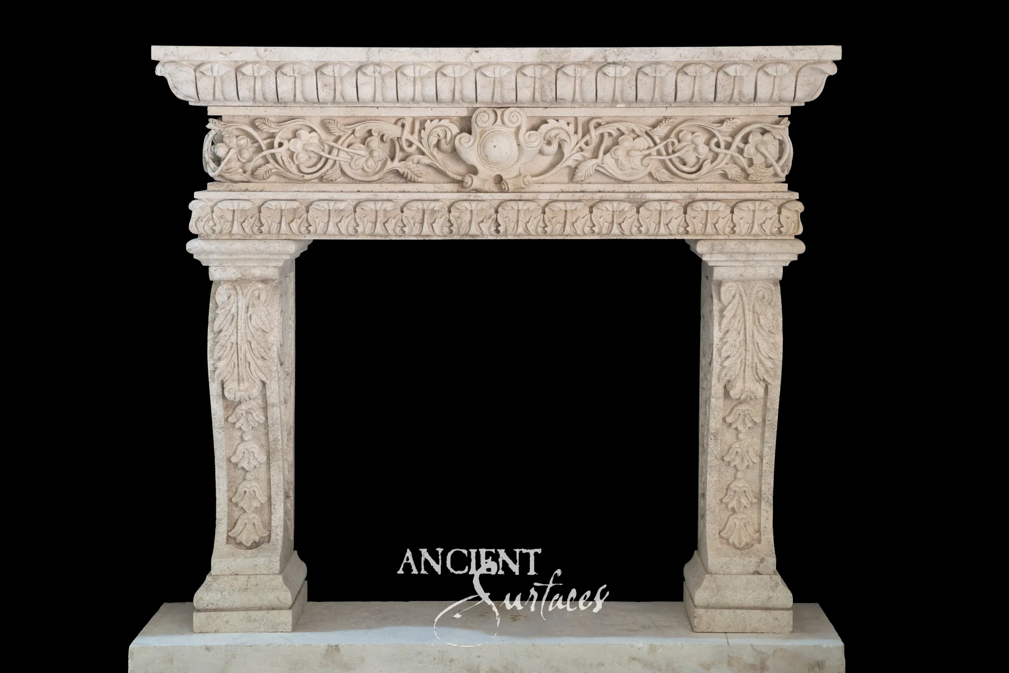 Tall reclaimed Renaissance limestone fireplace mantel from Ancient Surfaces with carved columns and a foliate frieze